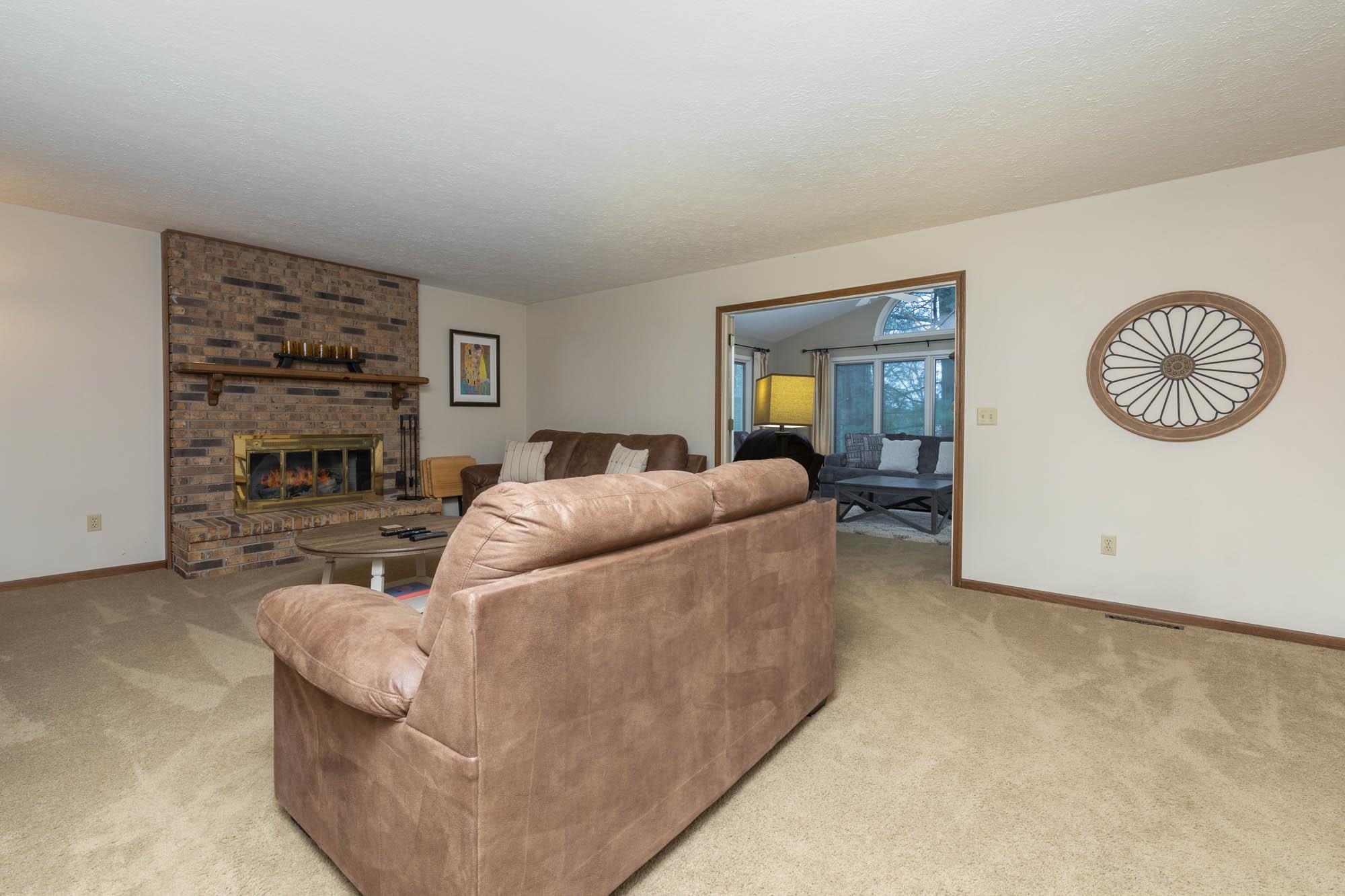 7113 Sentinel Road Rockford, IL 61107 - Photo 14 of 38 a living room with furniture and a flat screen tv