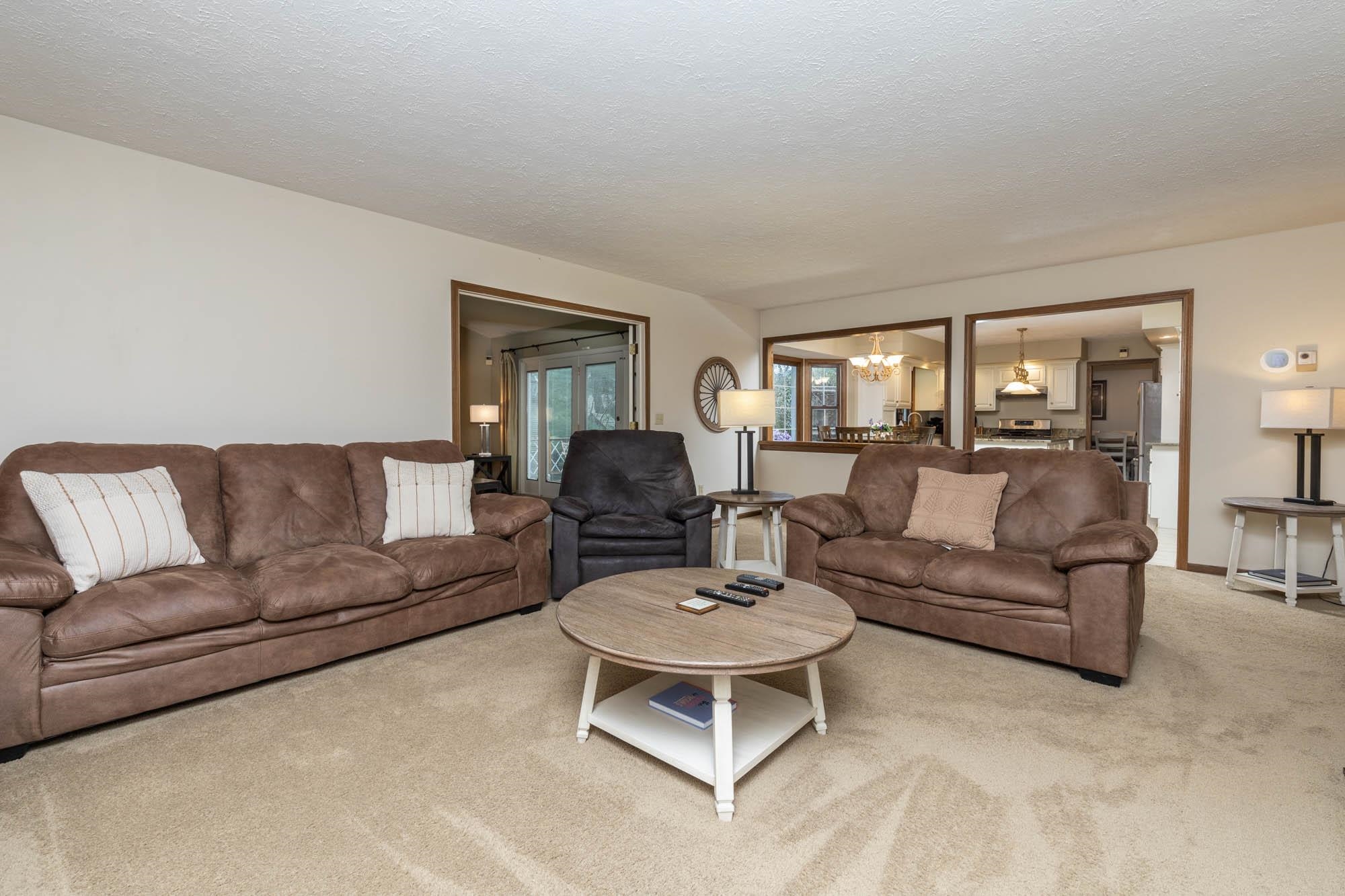 7113 Sentinel Road Rockford, IL 61107 - Photo 15 of 38 a living room with furniture and a large window