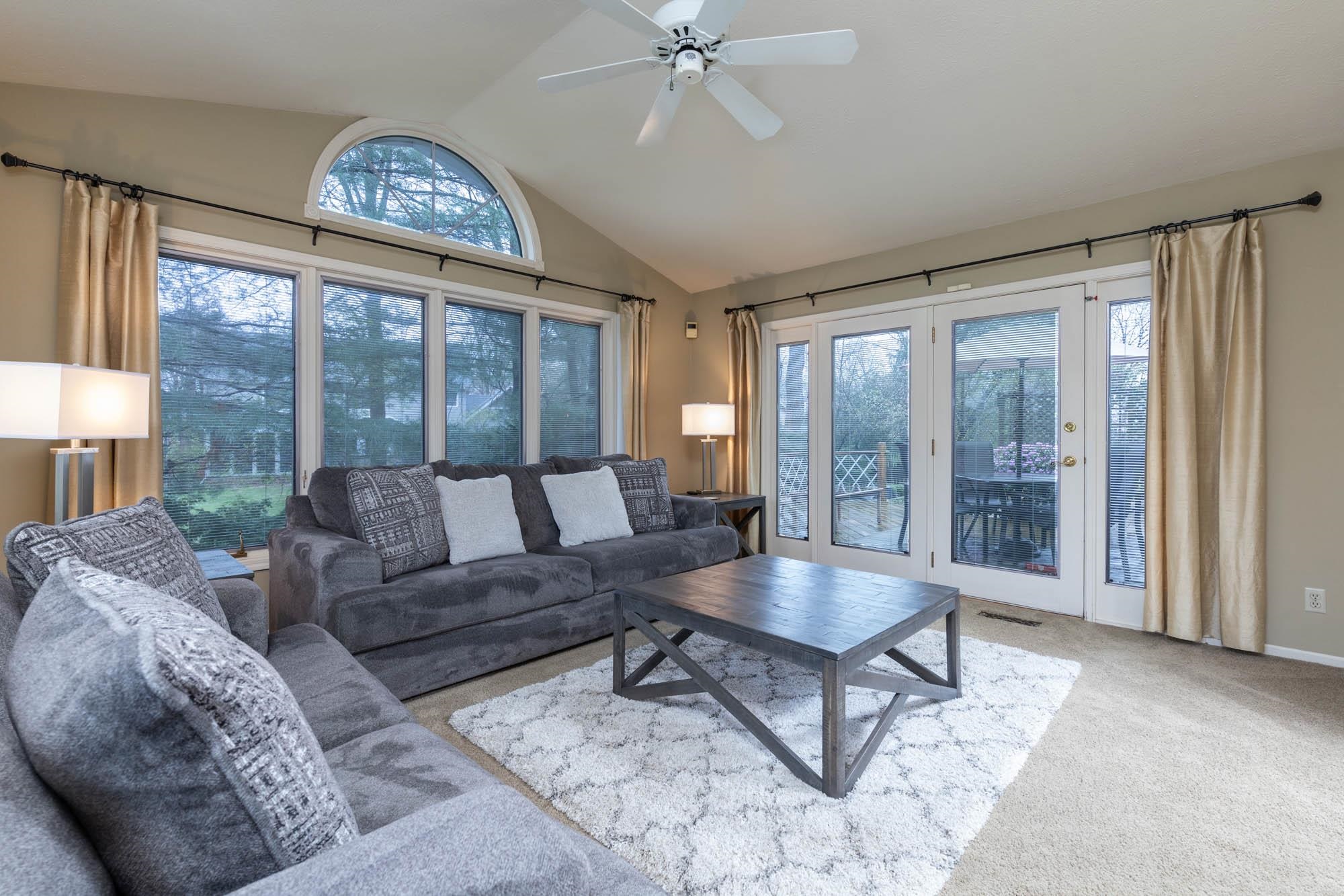 7113 Sentinel Road Rockford, IL 61107 - Photo 16 of 38 a living room with furniture and a large window