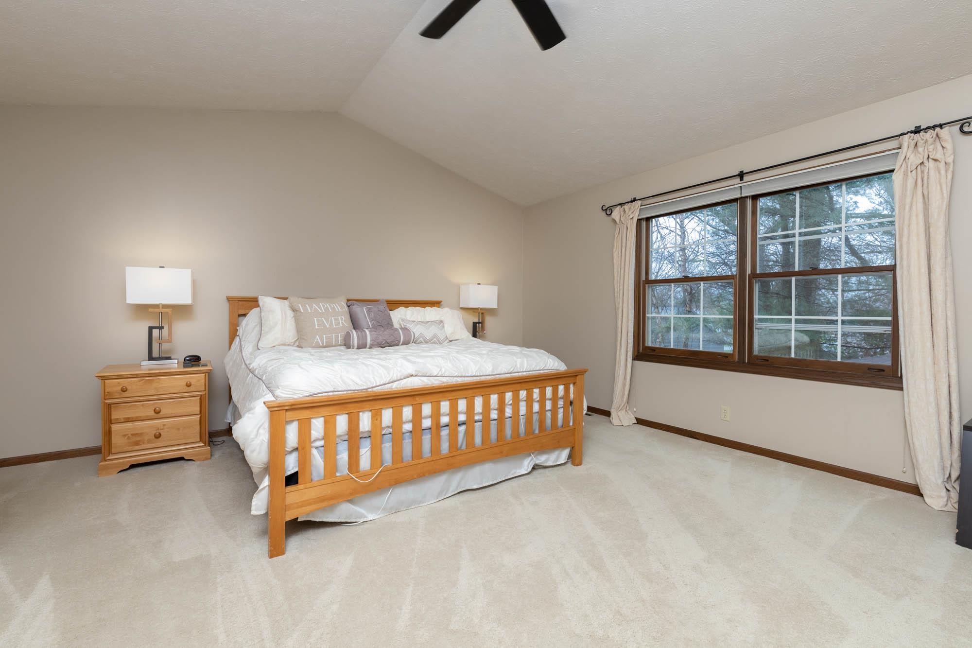 7113 Sentinel Road Rockford, IL 61107 - Photo 20 of 38 a bedroom with a bed and a large window