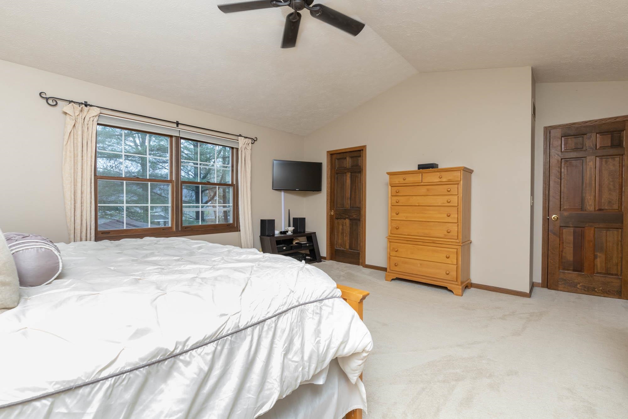 7113 Sentinel Road Rockford, IL 61107 - Photo 21 of 38 a bedroom with a bed and a large window