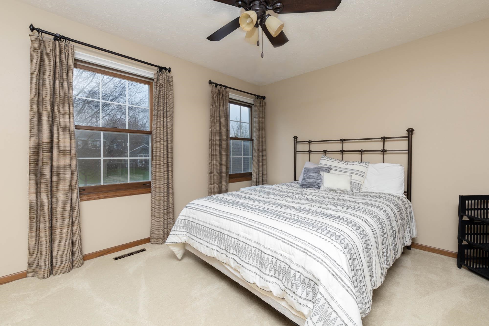 7113 Sentinel Road Rockford, IL 61107 - Photo 24 of 38 a bedroom with a bed and a window