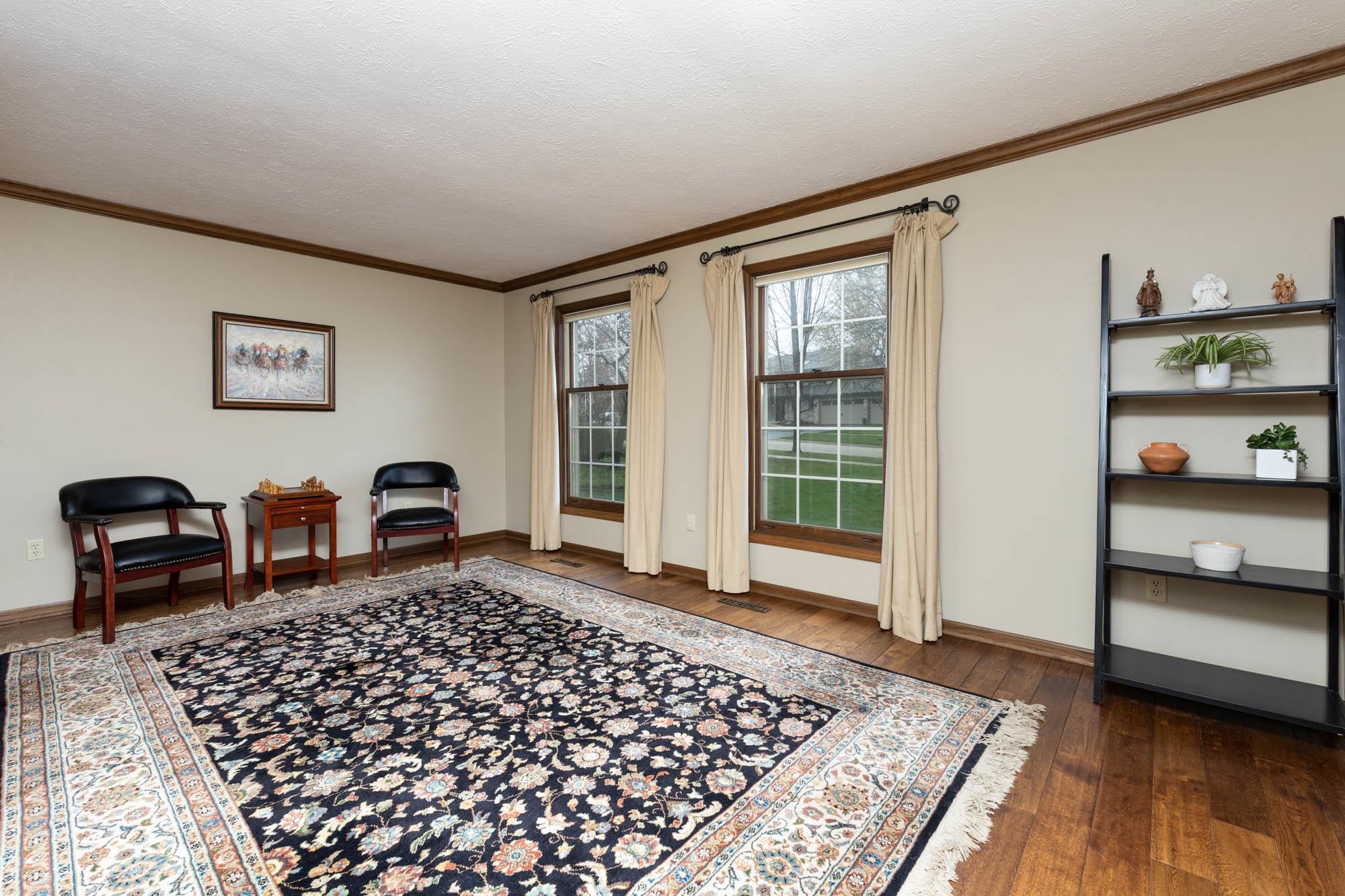 7113 Sentinel Road Rockford, IL 61107 - Photo 4 of 38 a bedroom with furniture and a window