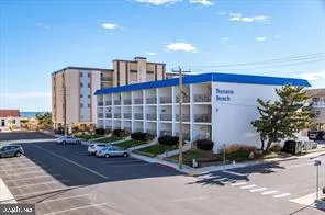a front view of a building with street view