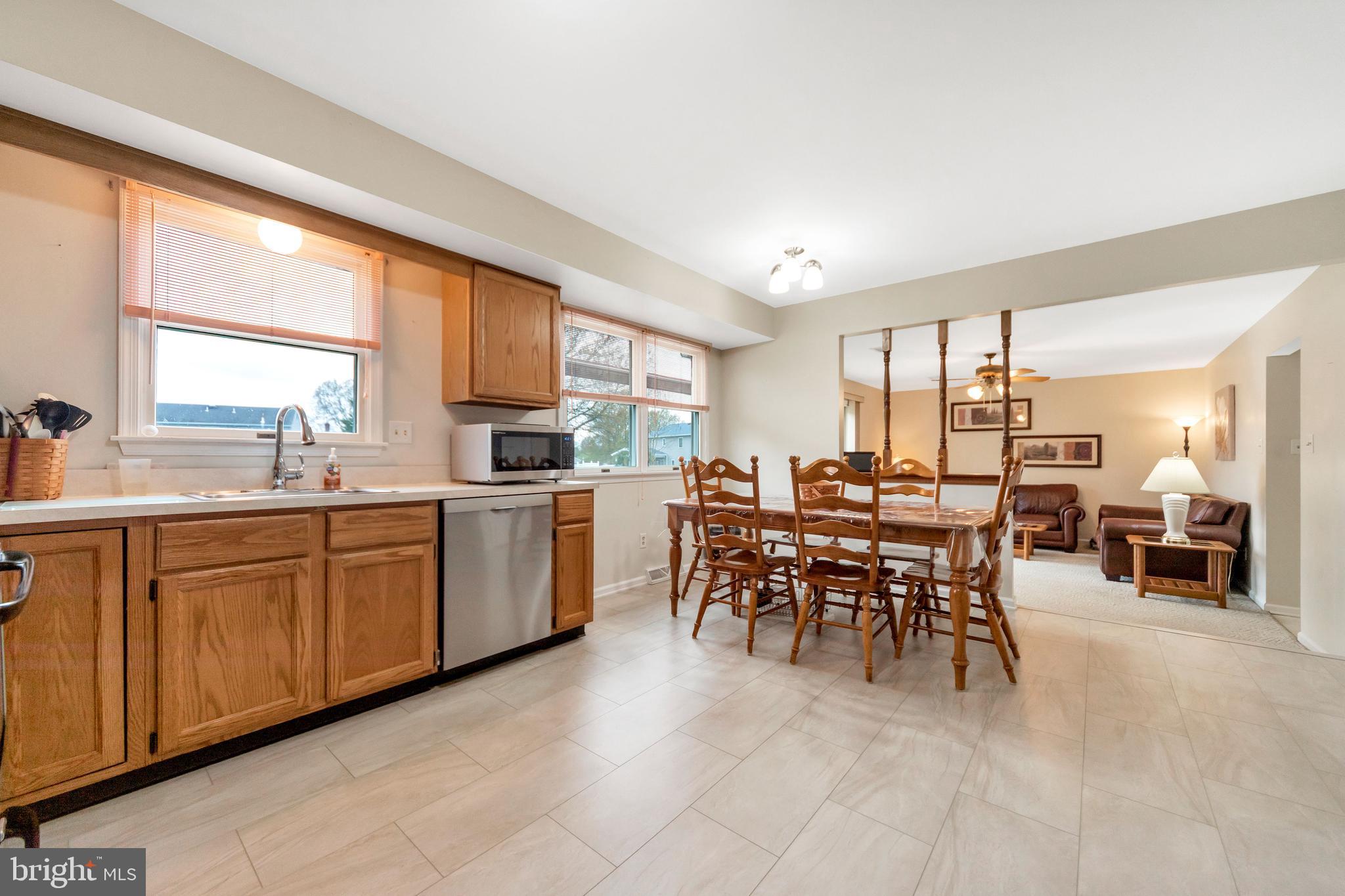 1072 Independence Way Hatfield, PA 19440 - Photo 17 of 37 a kitchen with sink a table and chairs