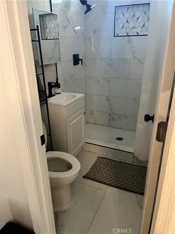a bathroom with a sink and a toilet