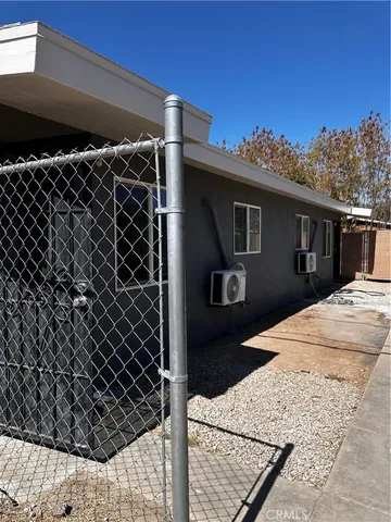 a view of house with wooden floor and outdoor space
