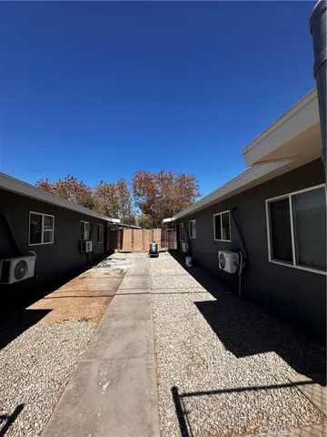 a house view with a backyard space