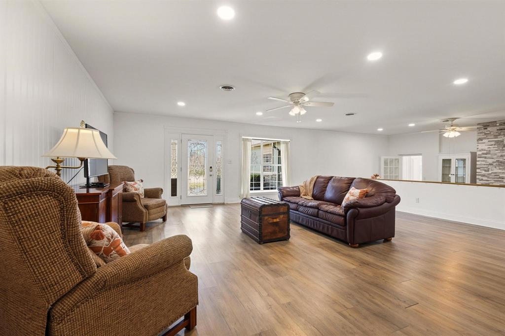 1053 Paradise Cove Road Pottsboro, TX 75076 - Photo 5 of 35 Living area featuring a ceiling fan, wood finished floors, and recessed lighting