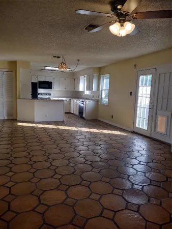 a view of a livingroom with furniture