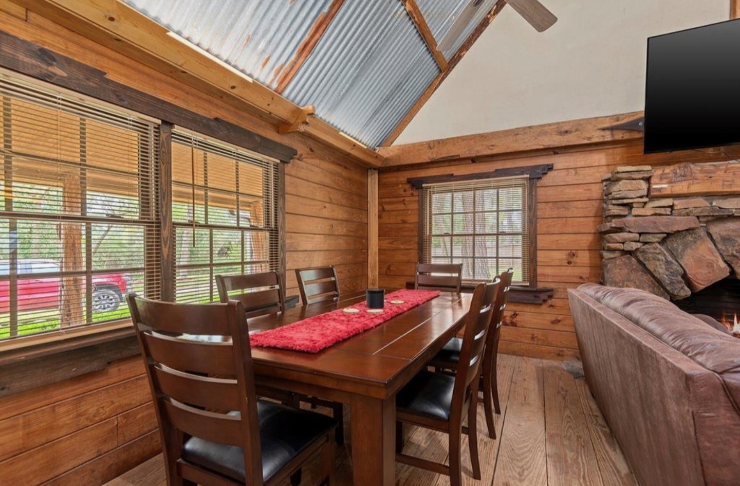 23207 Decker Prairie-Rosehill Road Magnolia, TX 77355 - Photo 14 of 29 a view of a dining room with furniture and wooden floor