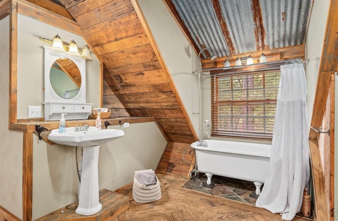 23207 Decker Prairie-Rosehill Road Magnolia, TX 77355 - Photo 15 of 29 a bathroom with a sink a toilet and bathtub