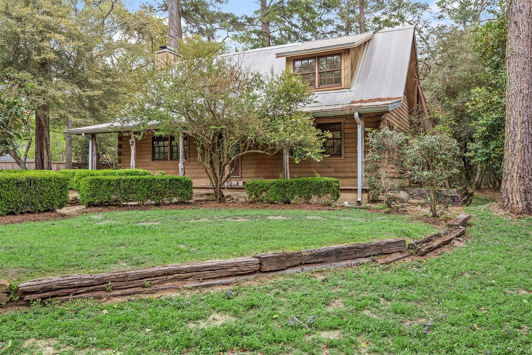 23207 Decker Prairie-Rosehill Road Magnolia, TX 77355 - Photo 28 of 29 a front view of a house with a yard