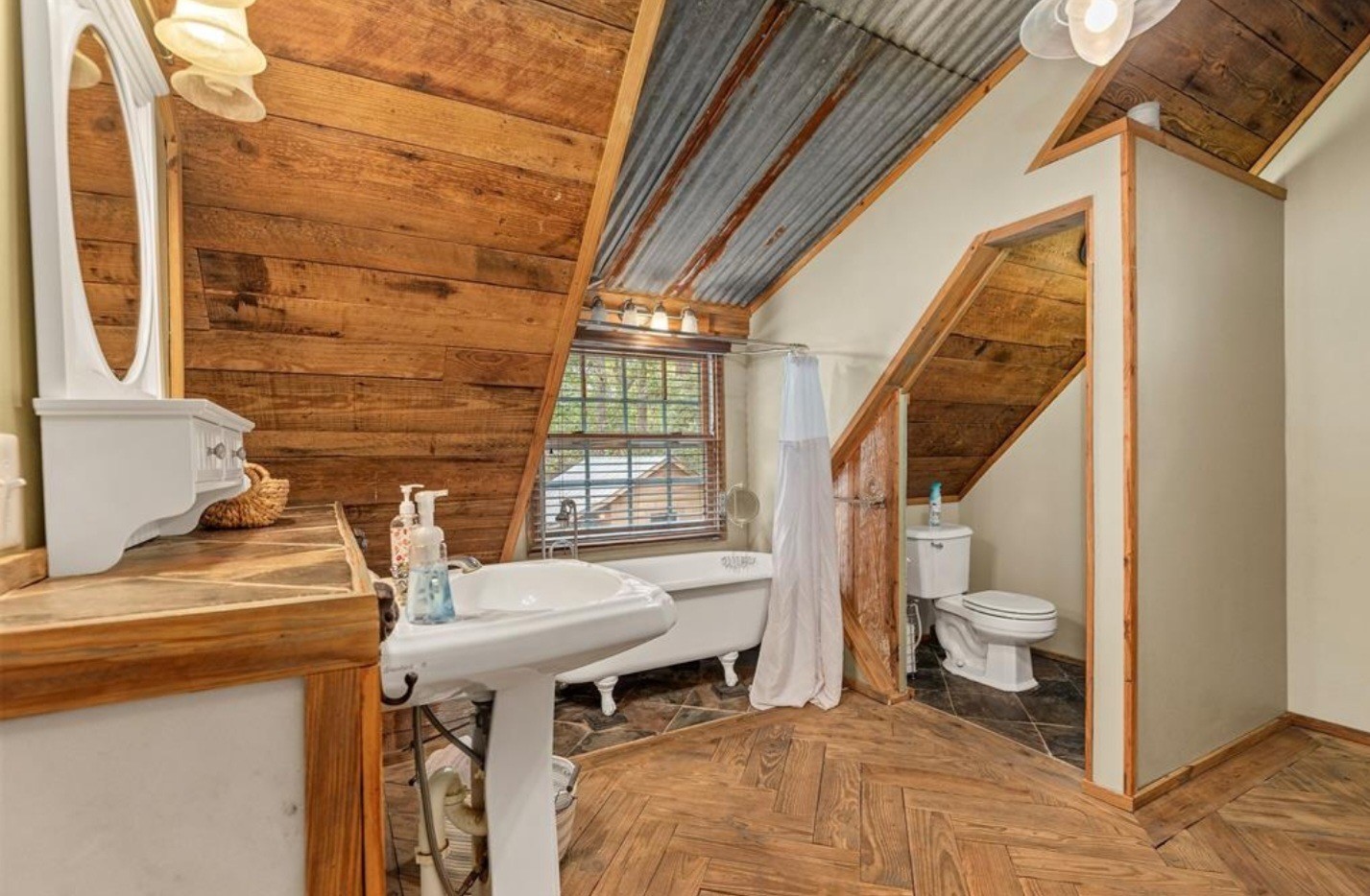 23207 Decker Prairie-Rosehill Road Magnolia, TX 77355 - Photo 5 of 29 a bathroom with a sink toilet and shower