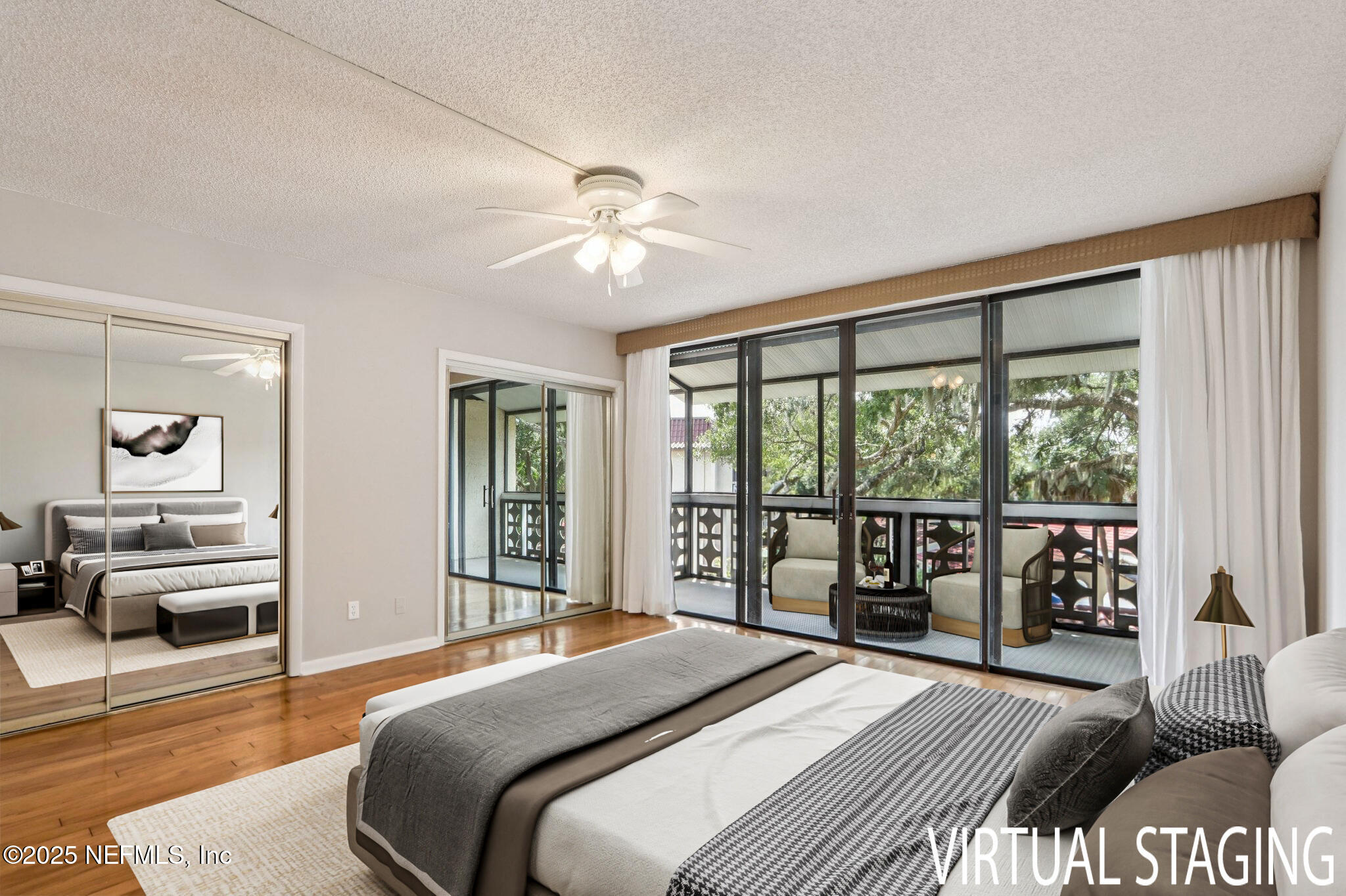 1810 Sevilla Boulevard West, Unit 307 Atlantic Beach, FL 32233 - Photo 17 of 28 a bedroom with a large bed and a large window