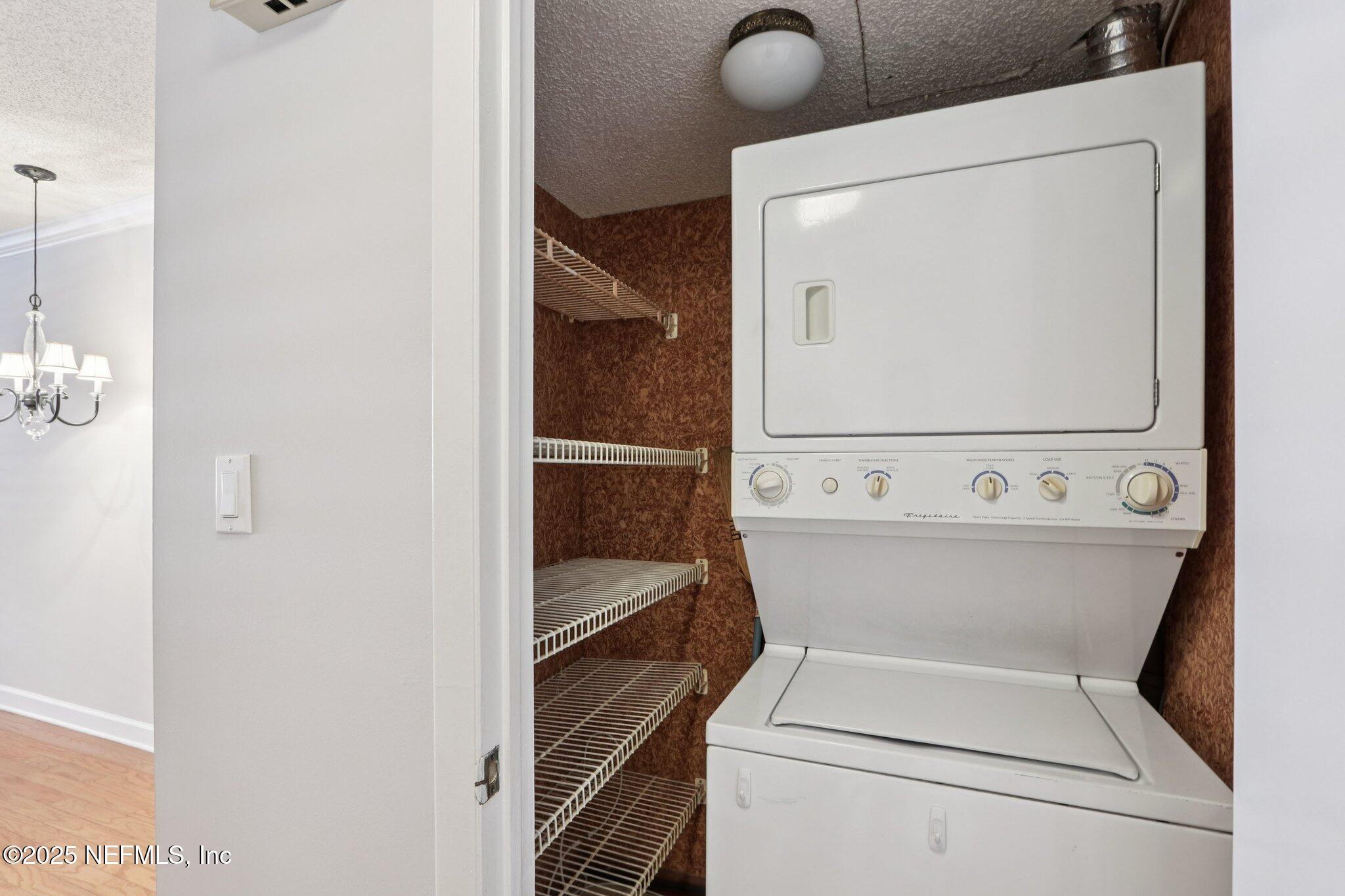 1810 Sevilla Boulevard West, Unit 307 Atlantic Beach, FL 32233 - Photo 20 of 28 a view of washer and dryer