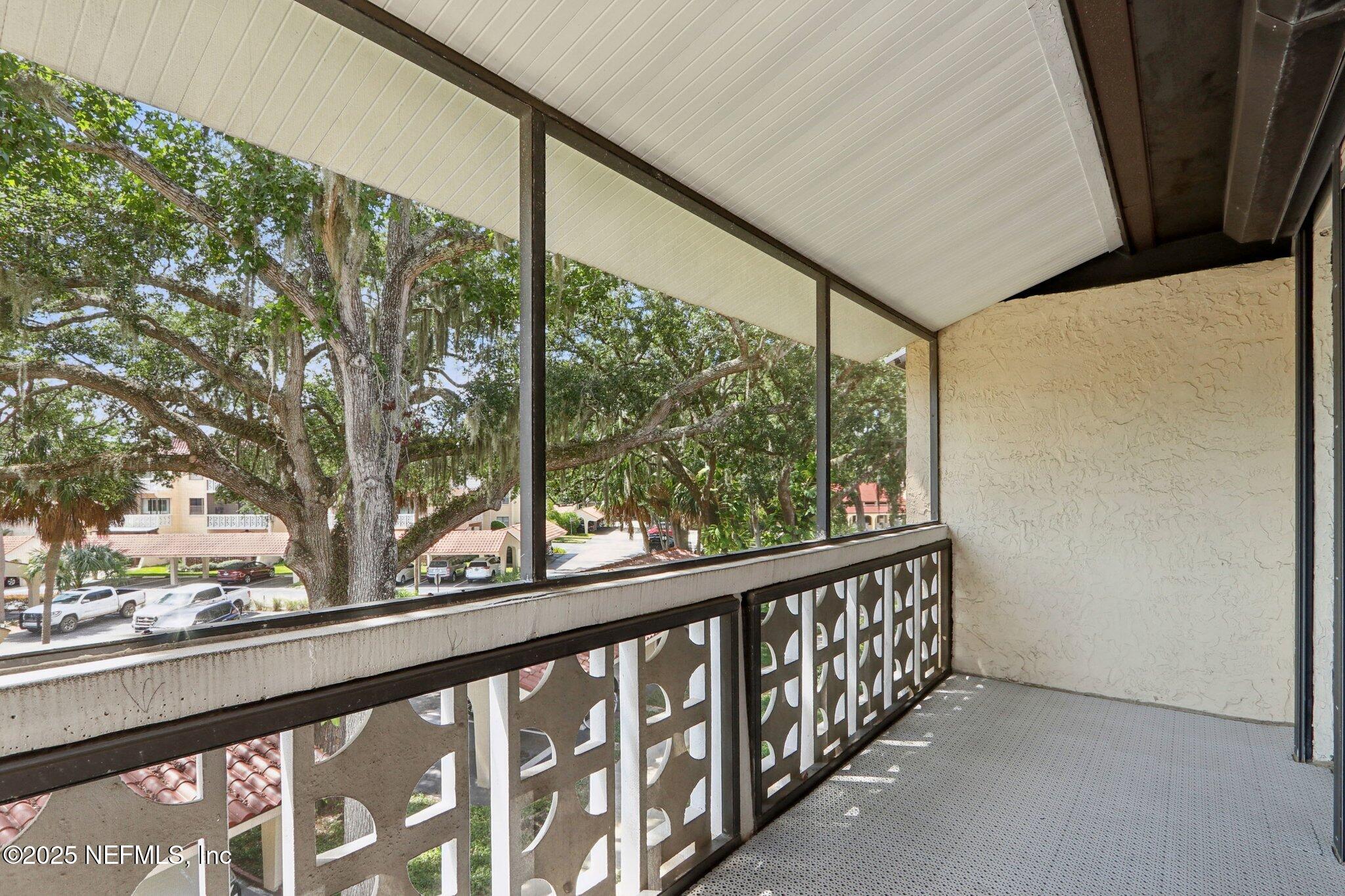 1810 Sevilla Boulevard West, Unit 307 Atlantic Beach, FL 32233 - Photo 21 of 28 a view of a porch