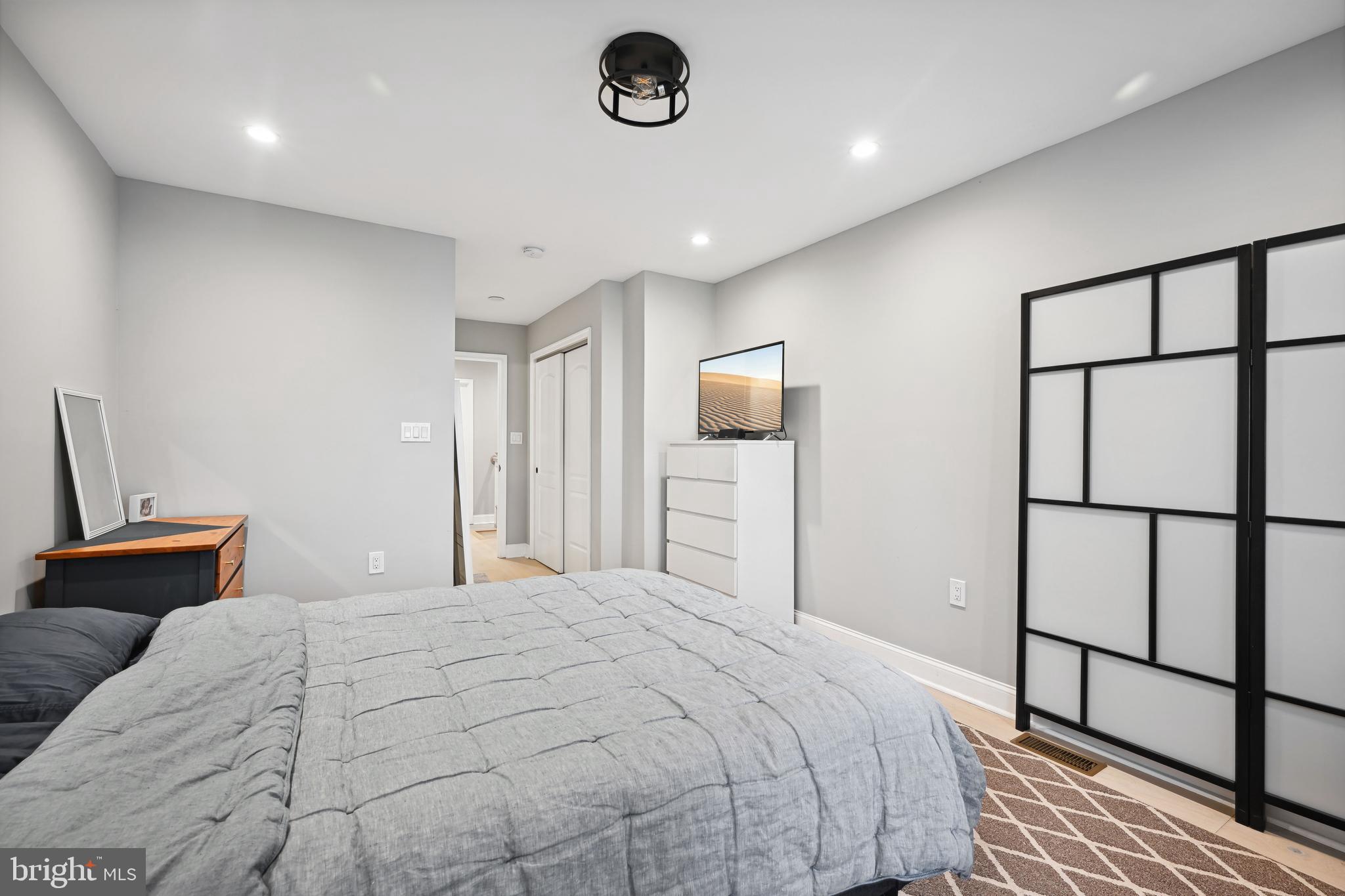 1732 L Street Northeast Washington, DC 20002 - Photo 11 of 20 a bedroom with a bed and a window