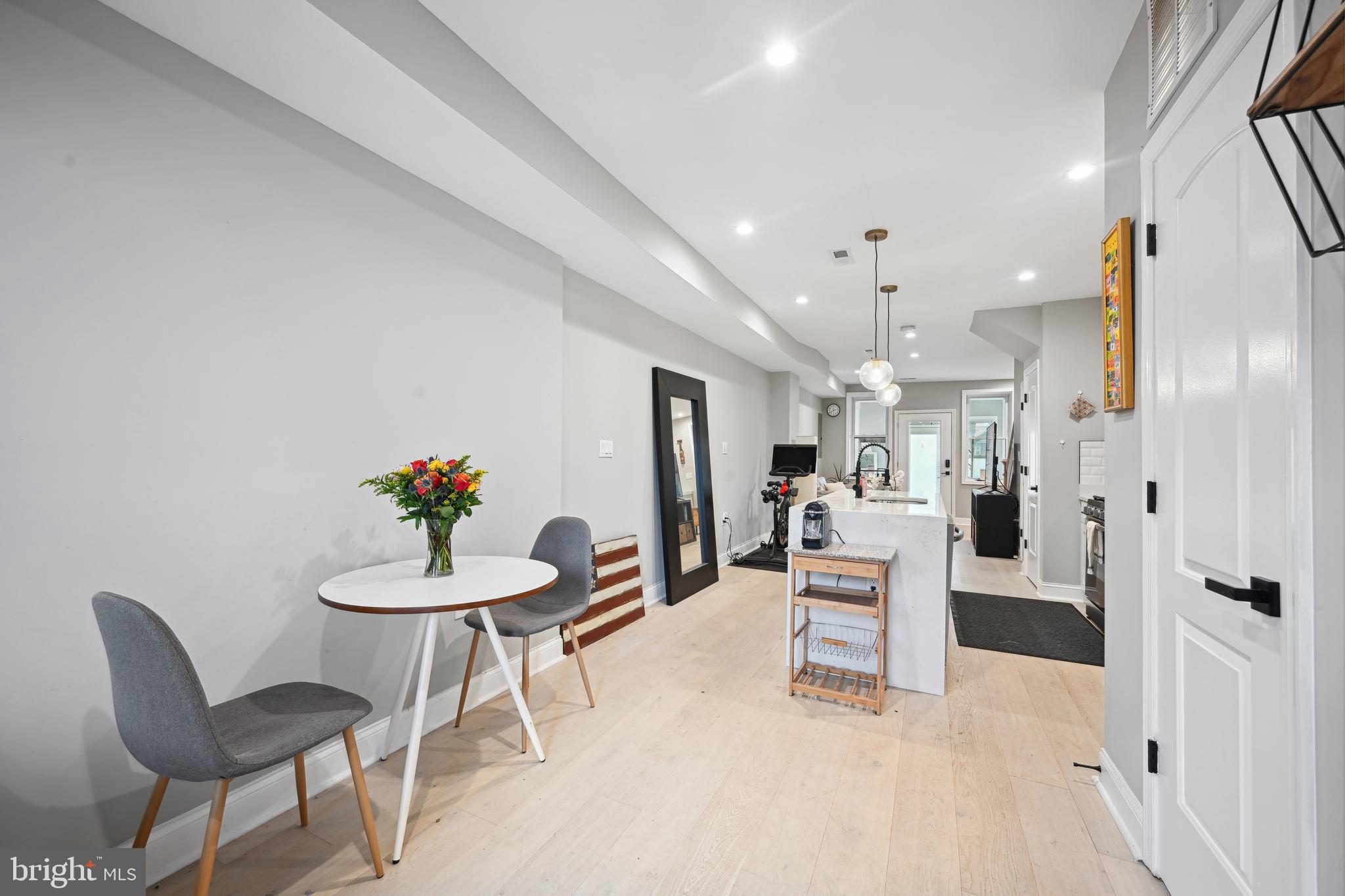 1732 L Street Northeast Washington, DC 20002 - Photo 4 of 20 a view of kitchen with furniture and wooden floor