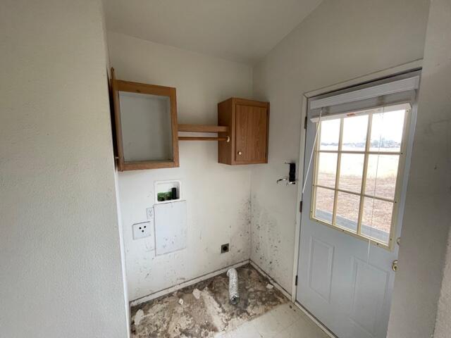 20875 Live Oak Road Red Bluff, CA 96080 - Photo 11 of 19 a room with a window and storage space