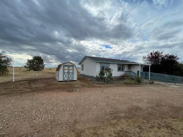 20875 Live Oak Road Red Bluff, CA 96080 - Photo 12 of 19 a view of a house with a backyard