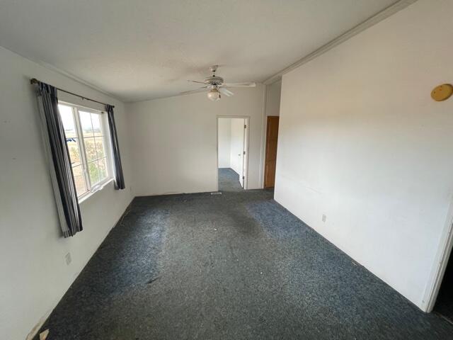 20875 Live Oak Road Red Bluff, CA 96080 - Photo 4 of 19 an empty room with windows and closet