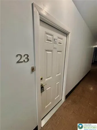 a kitchen with stainless steel appliances refrigerator a sink and a microwave