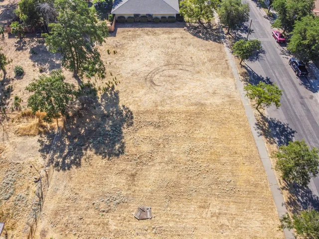a view of a backyard of a house