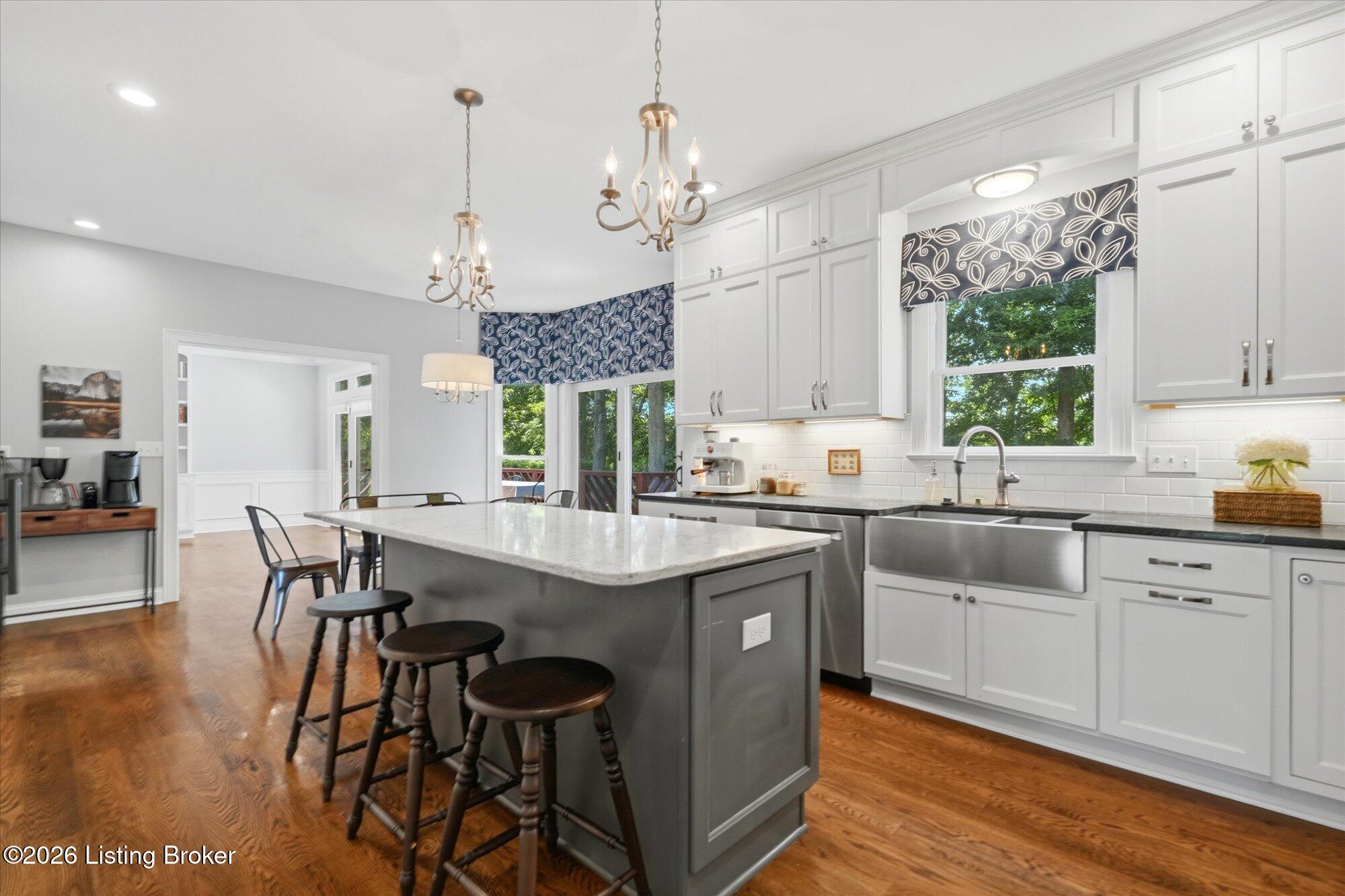 5722 Moser Farm Road Prospect, KY 40059 - Photo 13 of 65 The stunning kitchen is a true centerpiece of the home, offering an expansive island, generous cabinet storage, and an open, inviting layout.