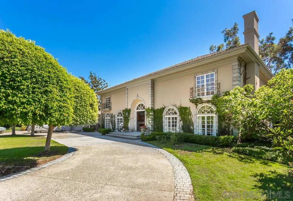 6645 Via Dos Valles Rancho Santa Fe, CA 92067 - Photo 1 of 20 a front view of a house with garden