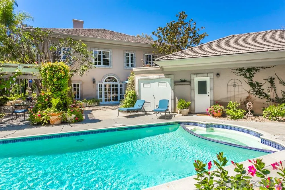 6645 Via Dos Valles Rancho Santa Fe, CA 92067 - Photo 11 of 20 a front view of a house with a porch and a fountain