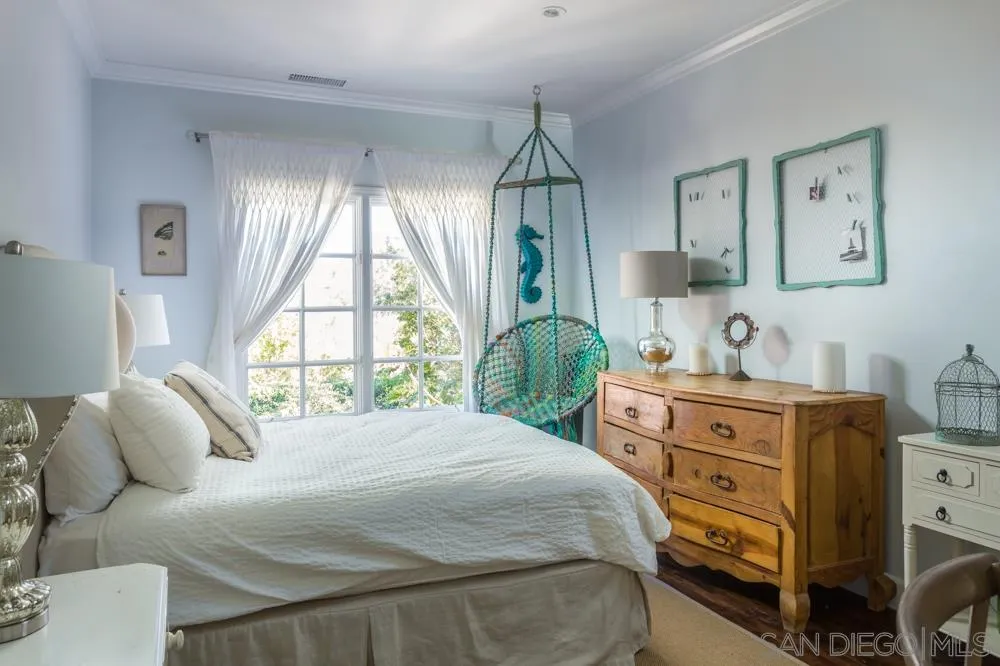 6645 Via Dos Valles Rancho Santa Fe, CA 92067 - Photo 17 of 20 a bedroom with a bed and a window