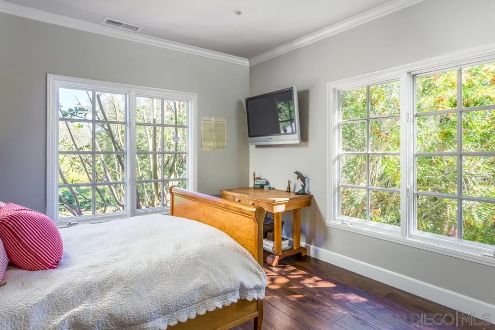 6645 Via Dos Valles Rancho Santa Fe, CA 92067 - Photo 18 of 20 a bedroom with a bed and wooden floor