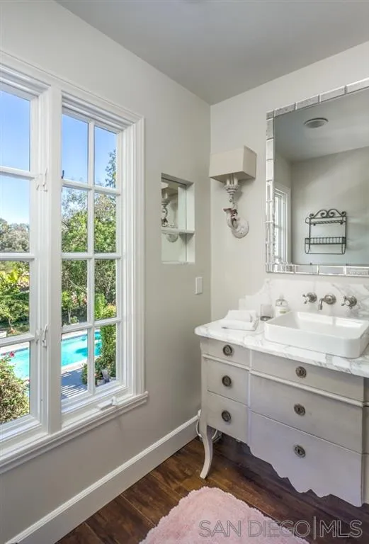 6645 Via Dos Valles Rancho Santa Fe, CA 92067 - Photo 20 of 20 a bathroom with a sink vanity granite and a window