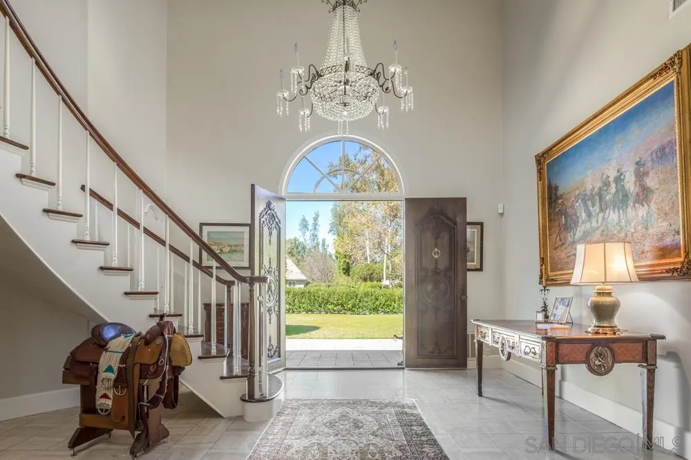 6645 Via Dos Valles Rancho Santa Fe, CA 92067 - Photo 4 of 20 a view of entryway with wooden floor and windows