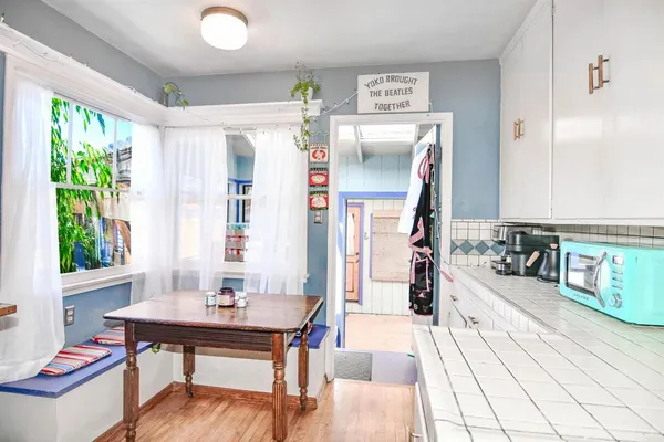 a living room with furniture and a gate