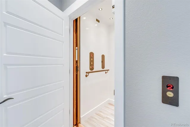 a view of a kitchen with washer and dryer