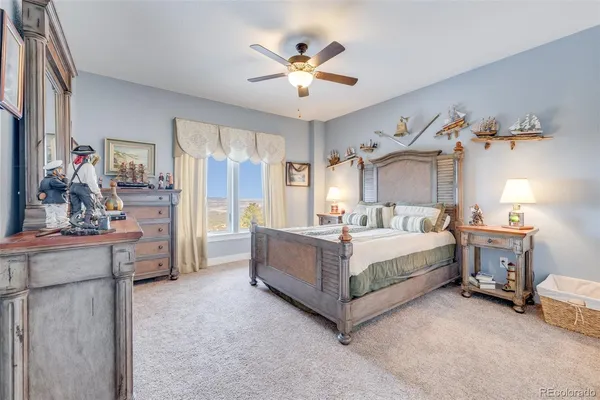 a bedroom with a bed and a cabinets
