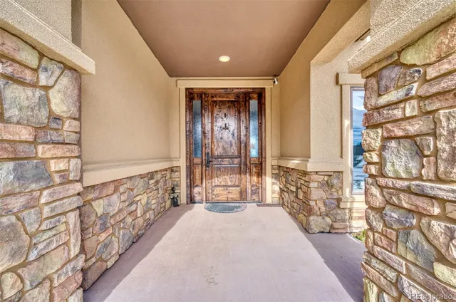 a view of entryway with wooden floor and a rug