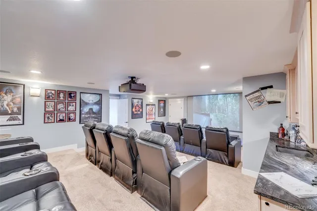 a view of a patio with table and chairs