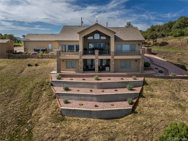 front view of house with wooden fence