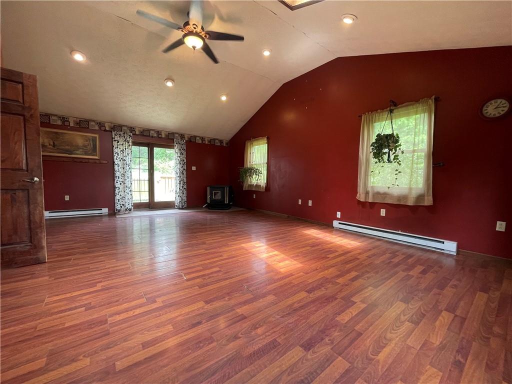 158 Eagle Mill Road Butler, PA 16001 - Photo 15 of 29 an empty room with wooden floor and windows