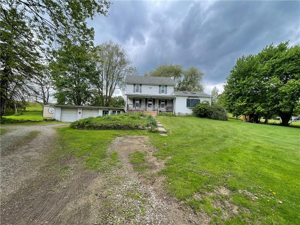158 Eagle Mill Road Butler, PA 16001 - Photo 2 of 29 a view of a big yard with palm trees