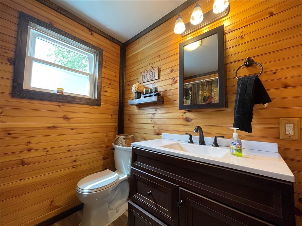 158 Eagle Mill Road Butler, PA 16001 - Photo 21 of 29 a bathroom with a sink a toilet and mirror