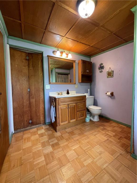 158 Eagle Mill Road Butler, PA 16001 - Photo 29 of 29 a bathroom with a sink a toilet and mirror