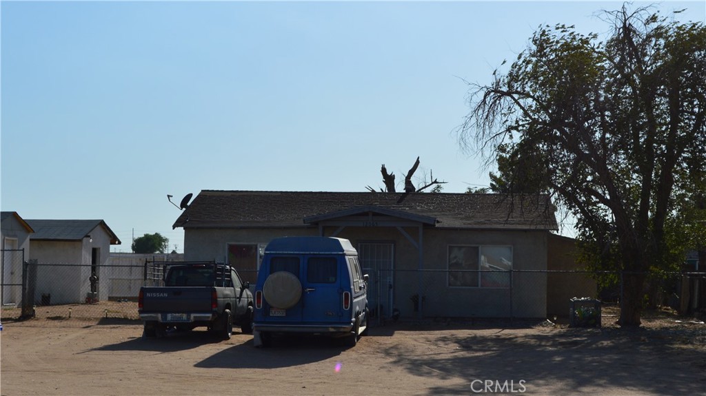 12065 Aztec Lane Adelanto, CA 92301 - Photo 16 of 64 a front view of a house