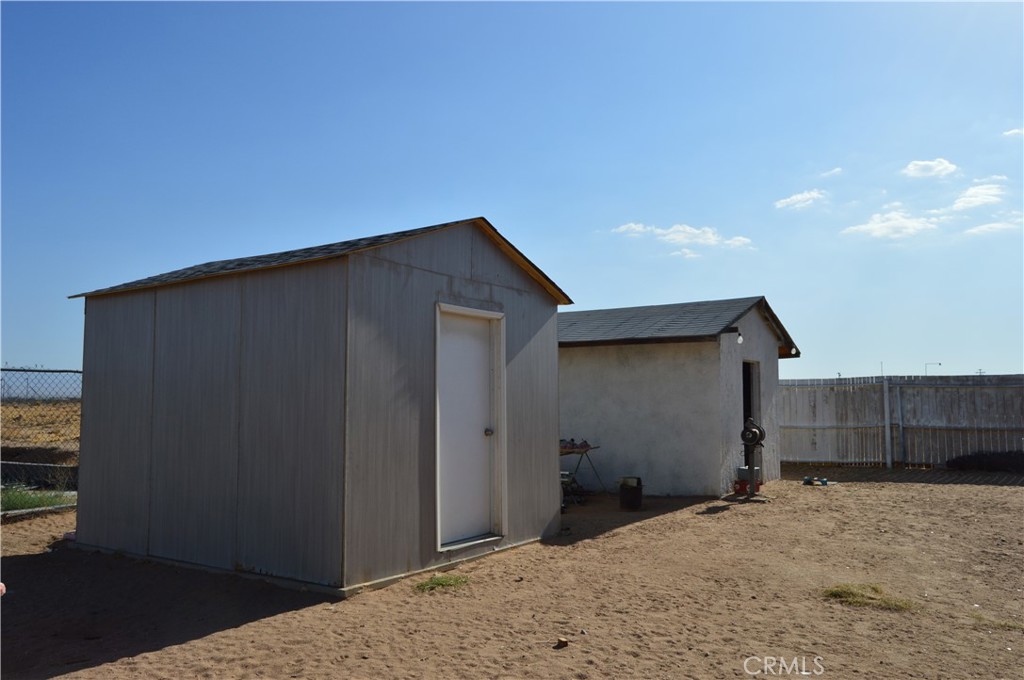 12065 Aztec Lane Adelanto, CA 92301 - Photo 22 of 64 a backyard of a house