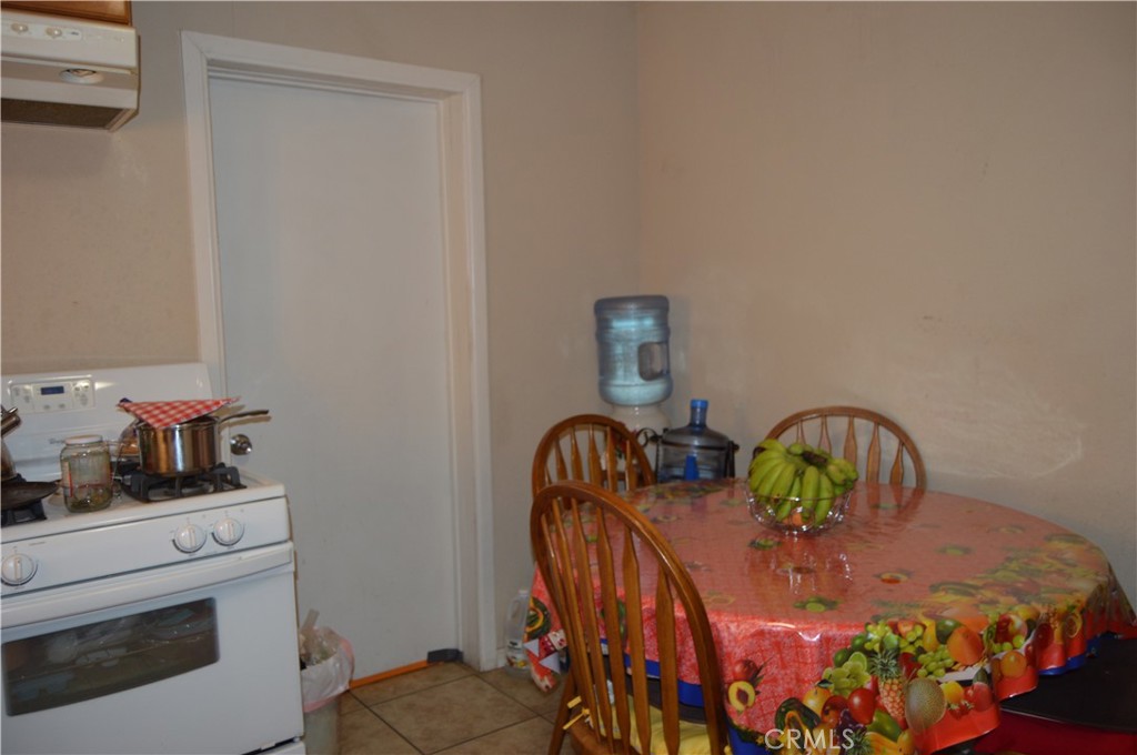 12065 Aztec Lane Adelanto, CA 92301 - Photo 54 of 64 a bedroom with bed and a window