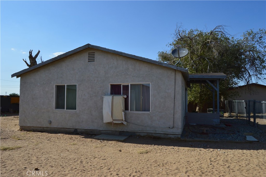 12065 Aztec Lane Adelanto, CA 92301 - Photo 10 of 64 a front view of a house