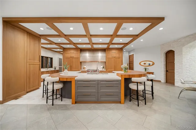 a view of a kitchen with furniture and a window